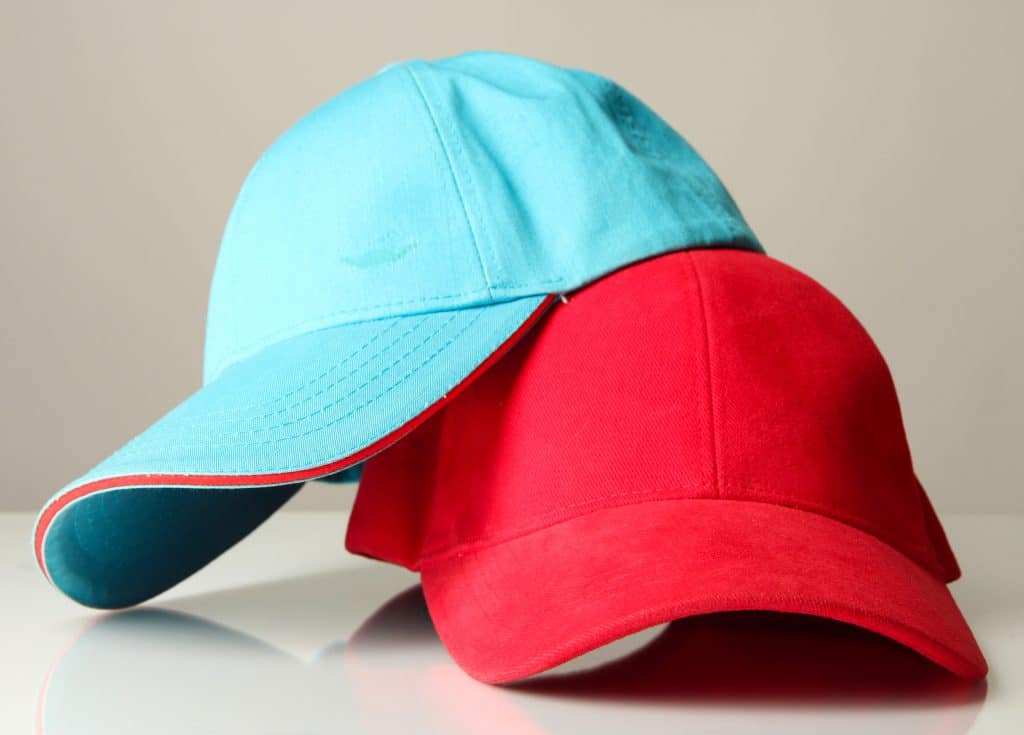 Red and blue caps cap isolated on white