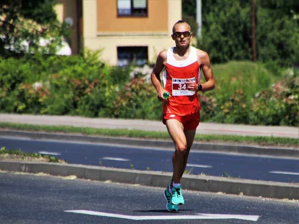 front shot for a man running in a marathon 