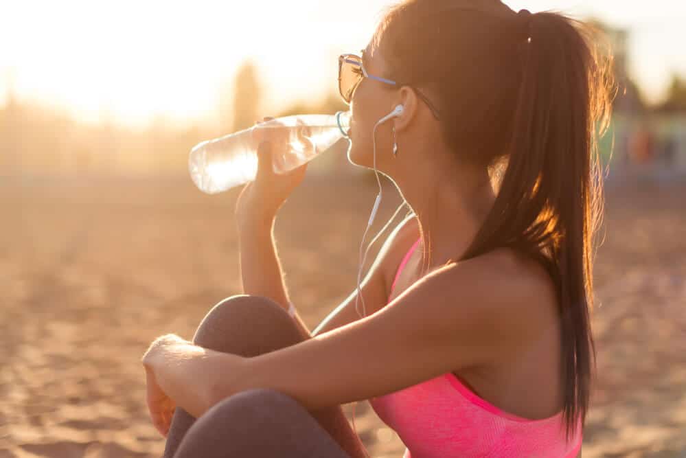 Runner drinking to stay hydrated