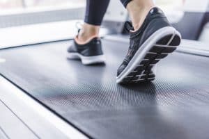 woman walking on treadmill