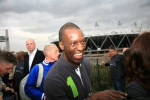 19 Famous Track Runners:Retired American sprinter Michael Johnson visits the Olympic Park in Stratford, London, UK, 31 October 2011. Double Olympic champion Edwin Moses on Monday (31 October 2011) called for sport to be used more as a tool against conflict at the Laureus Sport for Global Good Summit in London. The Summit has brought together representatives from 100 sports organisations from across the world. Moses had earlier been on a tour of the Olympic Park, led by London 2012 chairman and Laureus member Sebastian Coe, along with the likes of tennis great Boris Becker, four-time Olympic gold medallist Michael Johnson and five-time rowing Olympic champion Sir Steve Redgrave.
