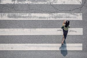 Woman walking on concrete