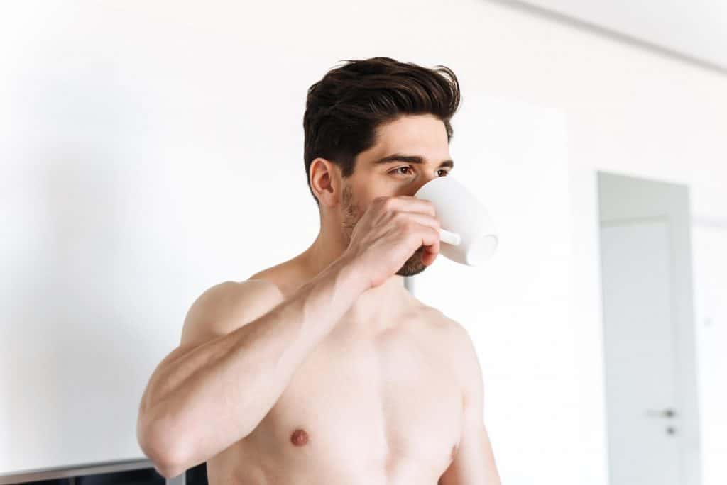 Pre Workout Before Running: athlete drinking coffee