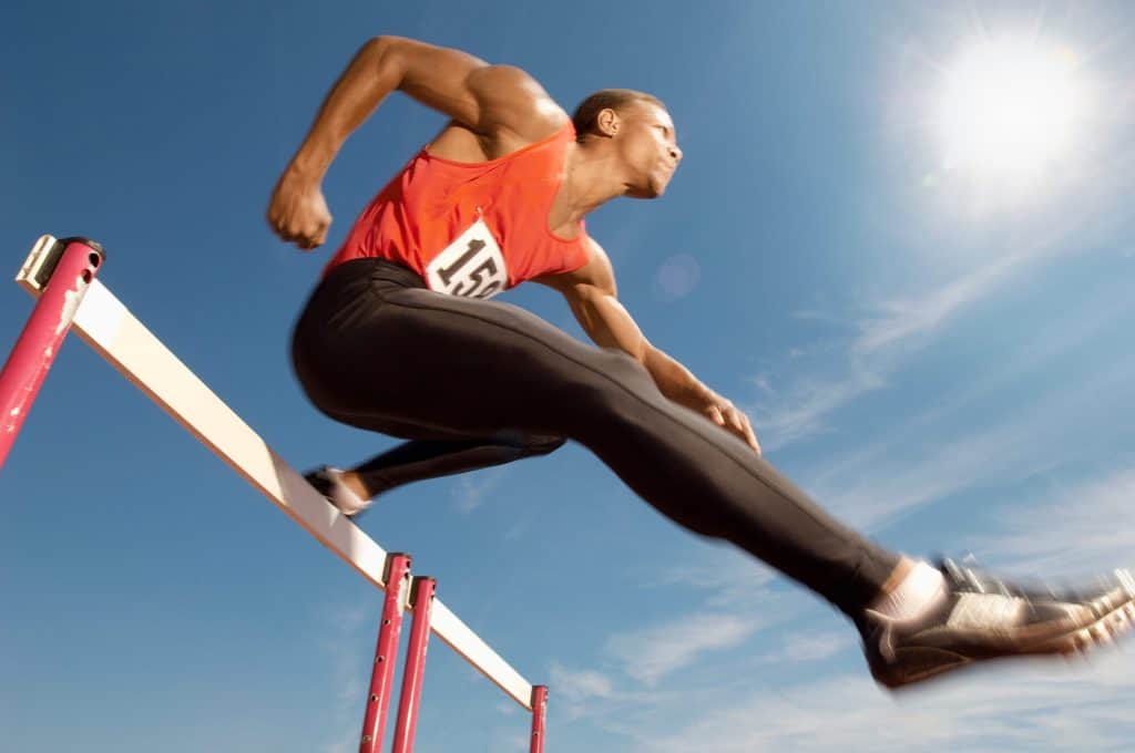 Who Broke Jesse Owens Record:low hurdle jump