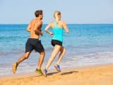 Couple running on the beach