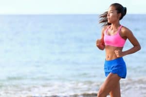 why do i run slow in my dreams: woman jogging on beach