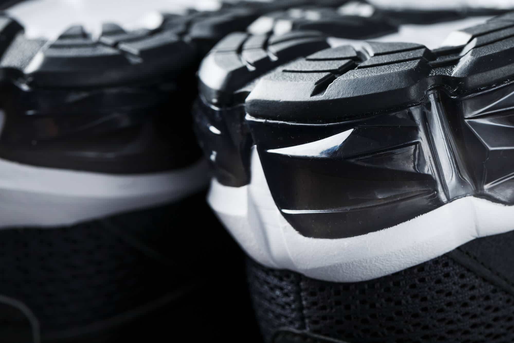 Close-up of black and white gel cushioning sports shoe sole