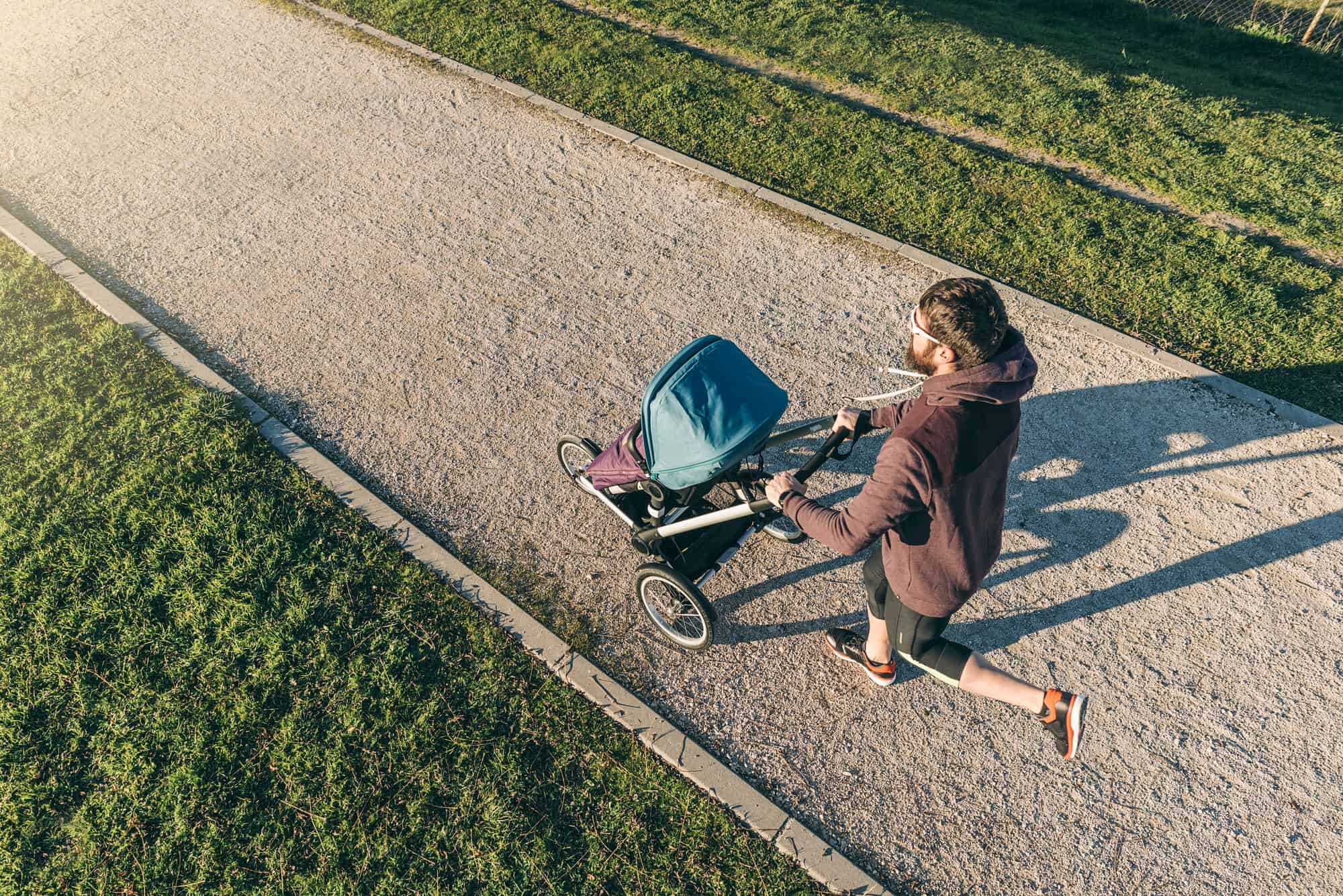 How Many More Calories Does Running With a Stroller Burn: Man Running with a stroller