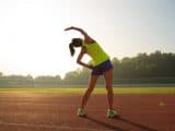 woman warming up before running