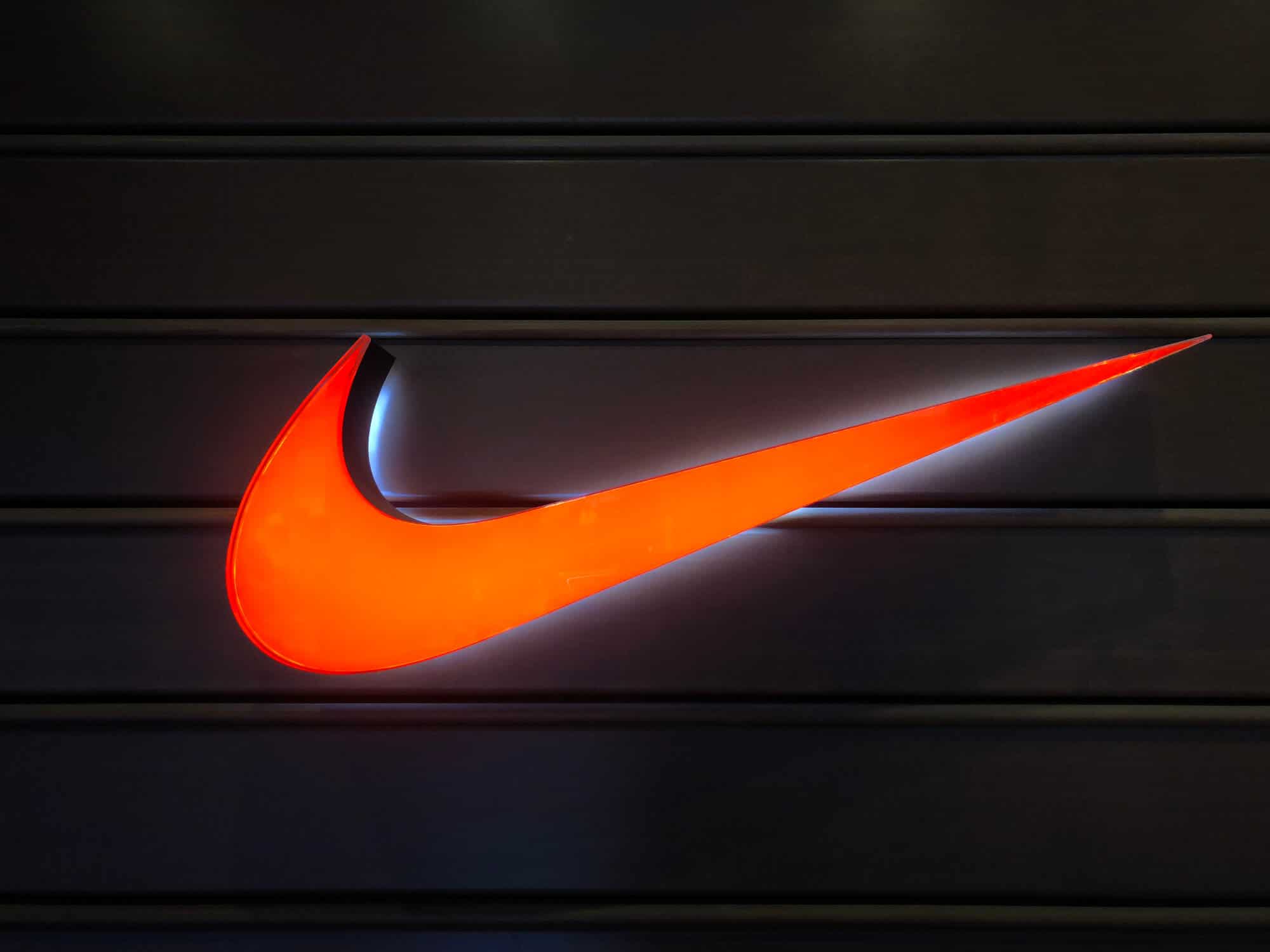 nike vs puma running shoes:Nike neon sign