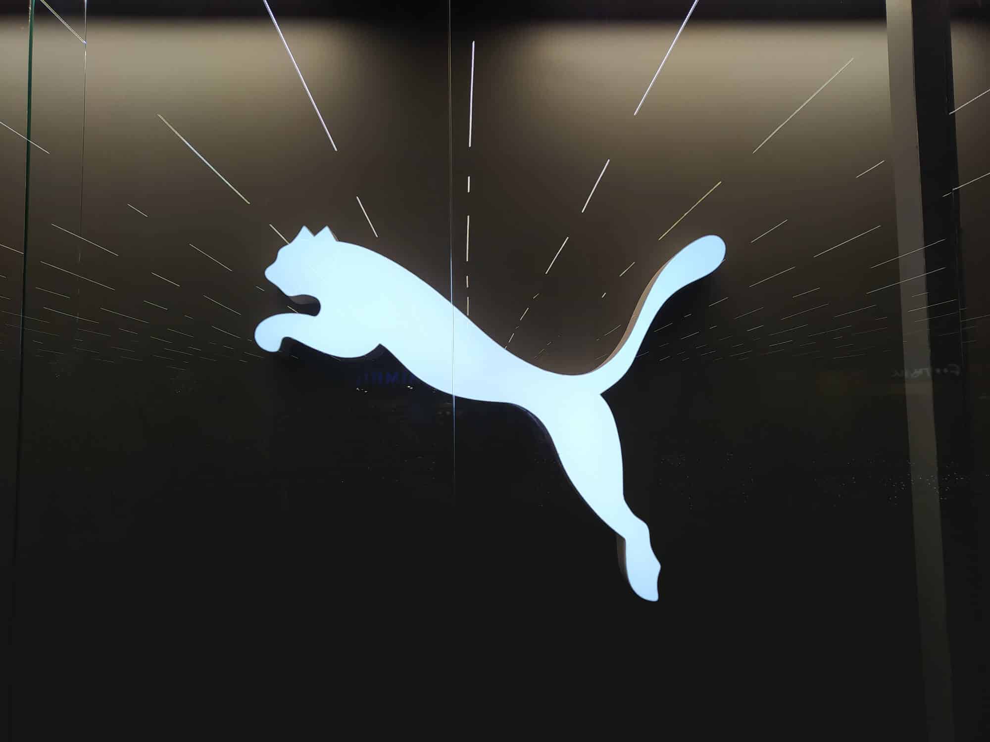 nike vs puma running shoes: Puma neon sign