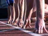 Athlete hands at start line